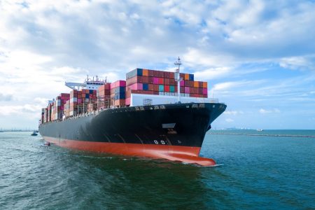 aerial-side-view-of-cargo-ship-carrying-container-2025-01-16-08-18-36-utc aerial-side-view-of-cargo-ship-carrying-container-2025-01-16-08-18-36-utc