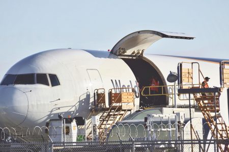 cargo-plane-being-loaded-to-deliver-packages-acros-2023-11-27-04-52-49-utc cargo-plane-being-loaded-to-deliver-packages-acros-2023-11-27-04-52-49-utc